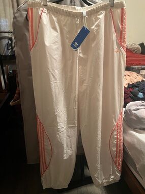 ADIDAS Track Pants with Coral Stripe Accents